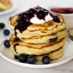stack of blueberry oat greek yogurt pancakes