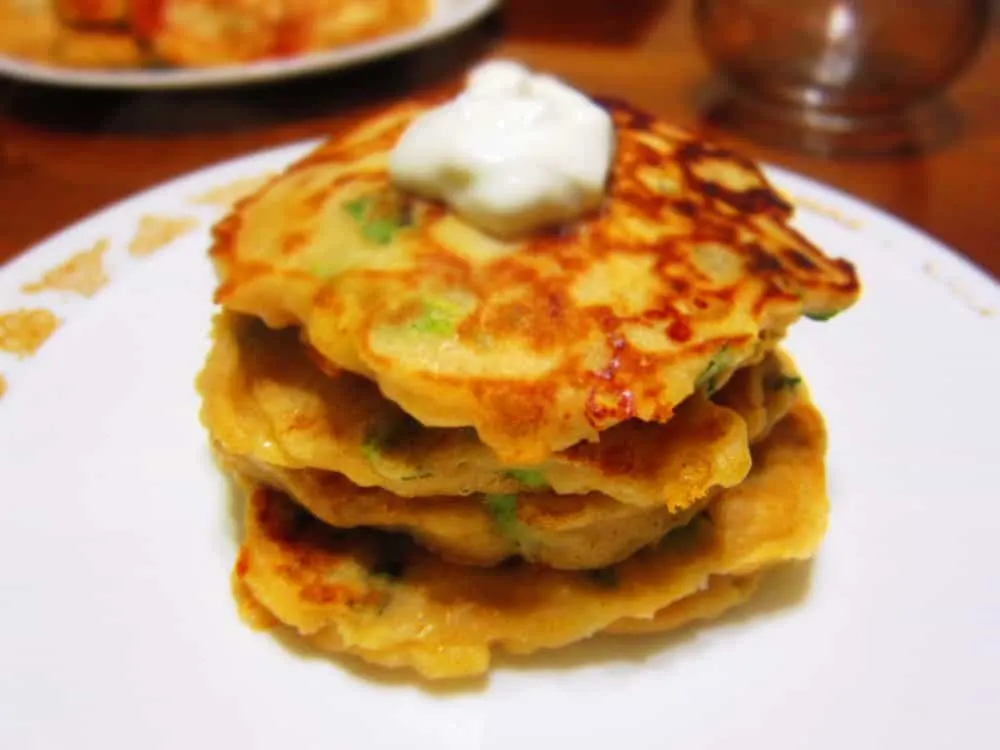 Cheesy Savory Pancakes with Scallions, served with Lime Crema