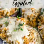 pinterest image of sausage stuffed eggplant
