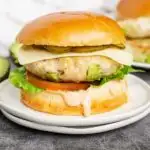 Avocado chicken burgers on a plate