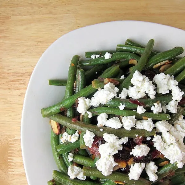 Green Beans with Cranberries Almonds Goat Cheese and Balsamic Glaze
