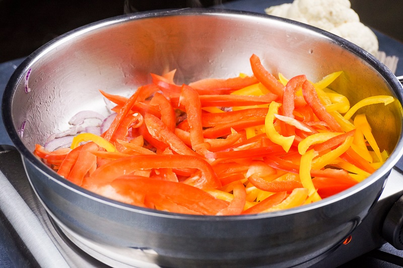 Soba Noodle Chicken and Vegetables Stir Fry in a Spicy Peanut Sauce