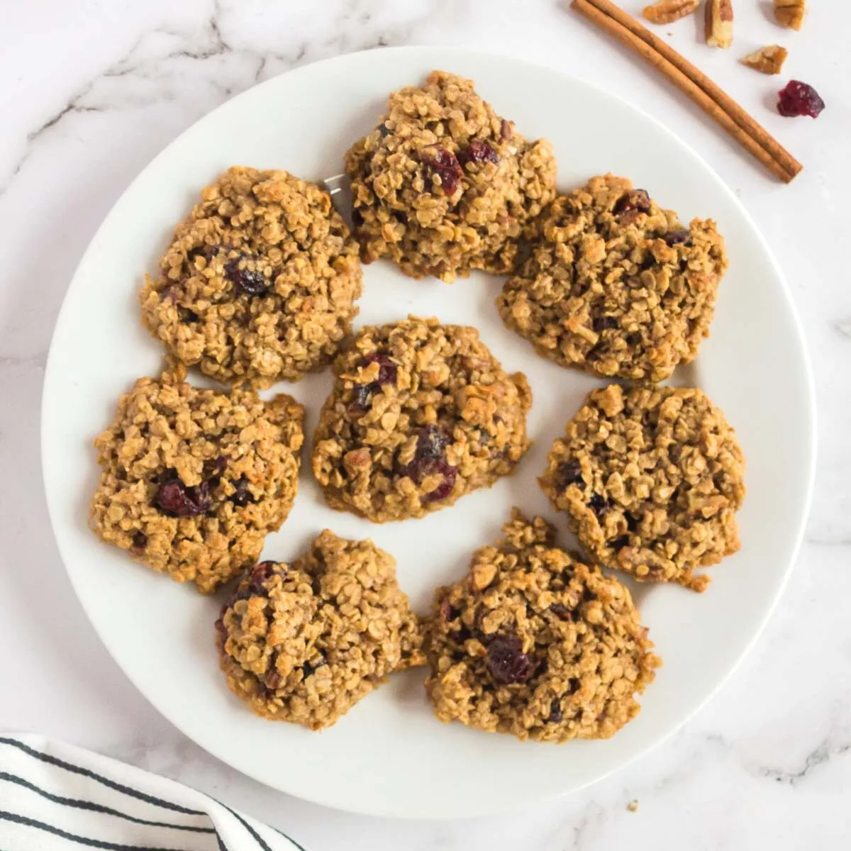 Oatmeal craisin pecan cookies on a plate
