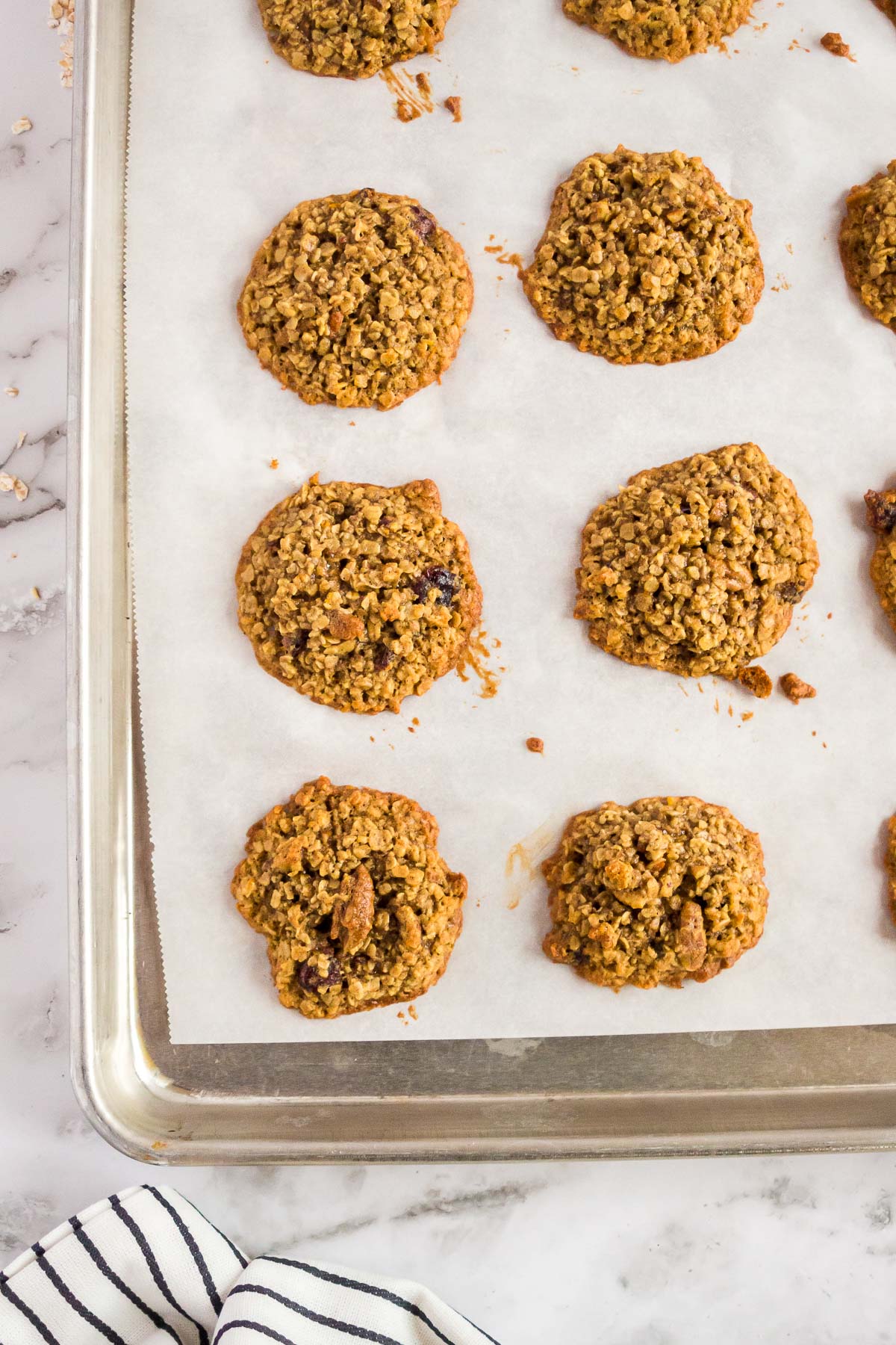 Baked oatmeal craisin cookies on a cookie sheet