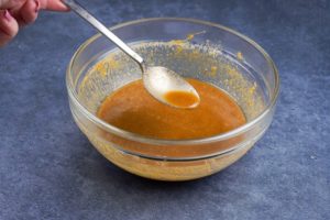 stir fry peanut sauce in a mixing bowl
