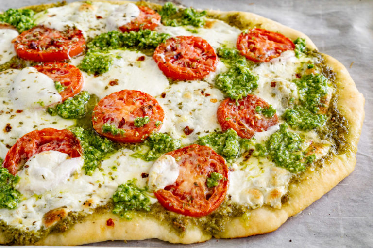 Pesto Pizza with Fresh Mozzarella and Tomatoes Babaganosh