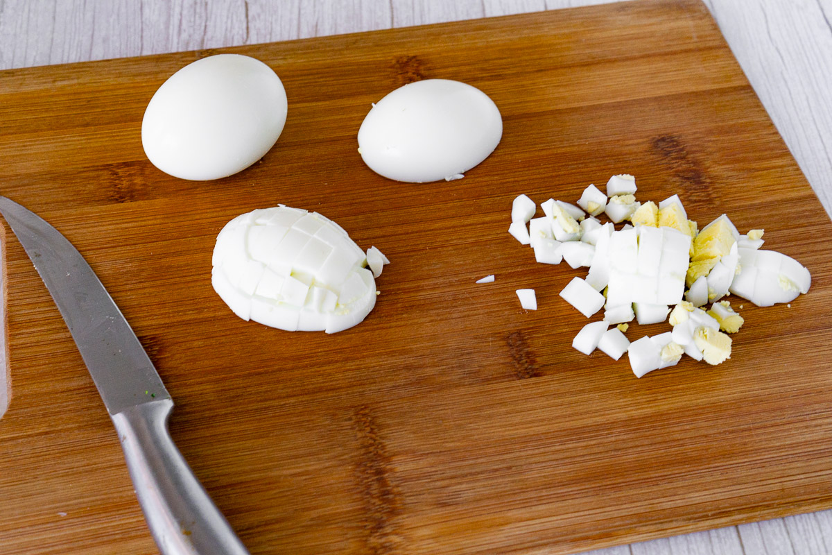 chopped eggs on a cutting board