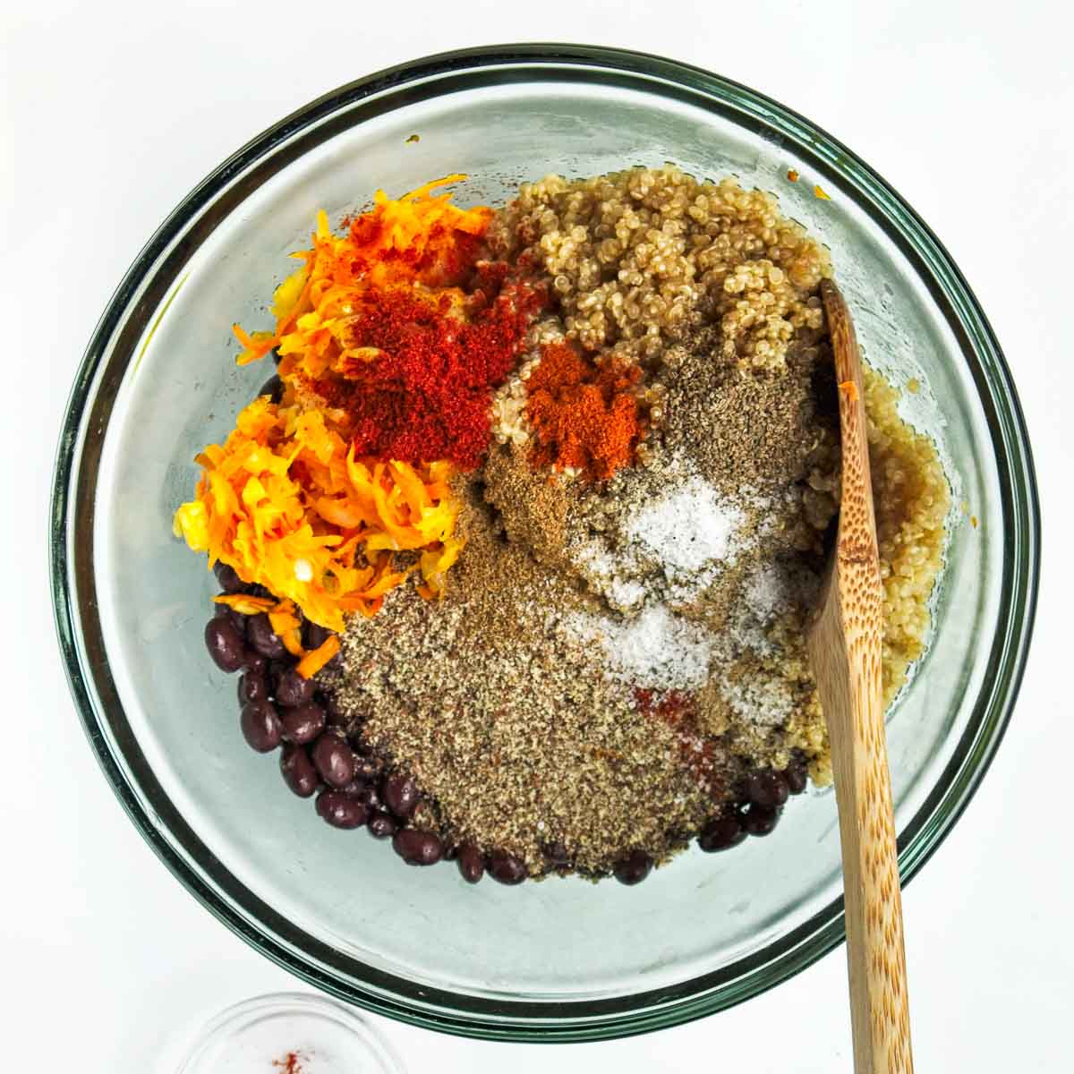 Ingredients to make black bean quinoa burgers in a bowl