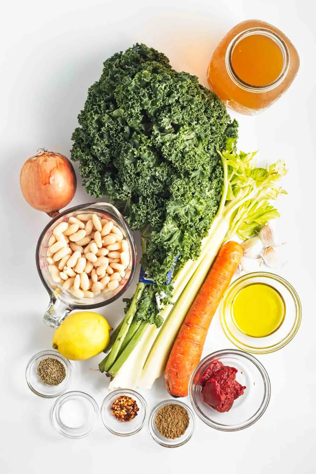Ingredients to make kale and white bean soup