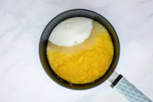 roughly blended pineapple and sugar in a saucepan