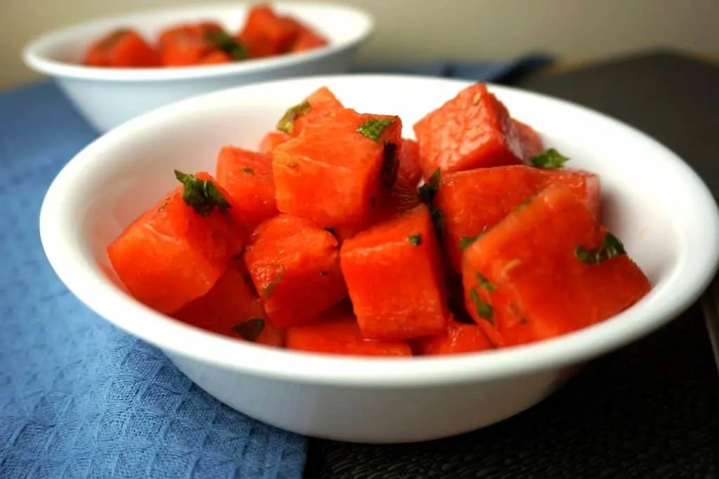 watermelon salad with honey lime dressing in a bowl