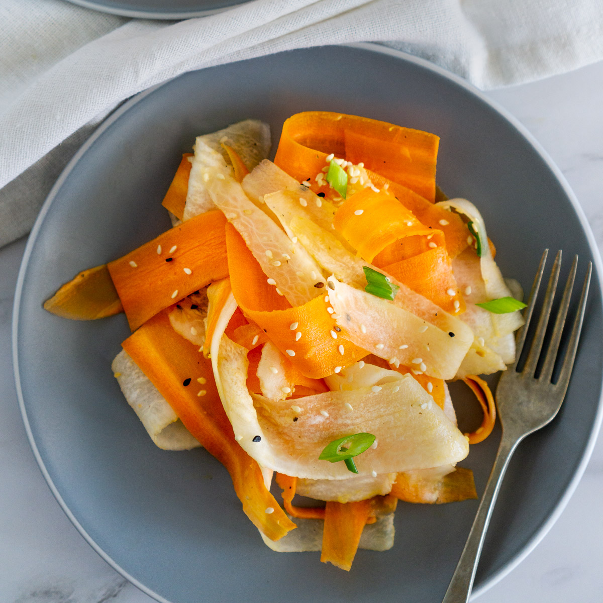 carrot daikon salad on a plate