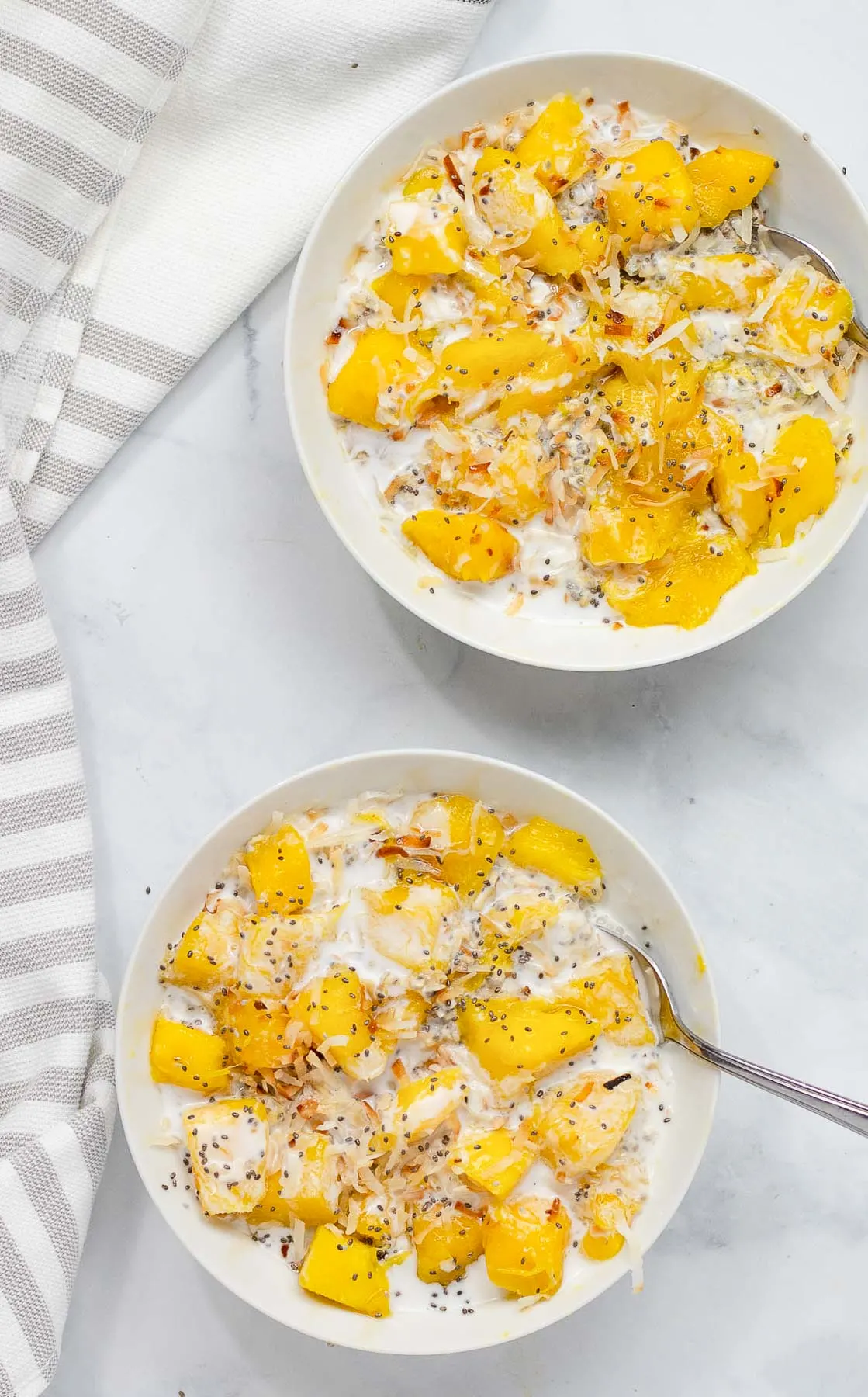 2 bowls of mango oatmeal with chia and coconut