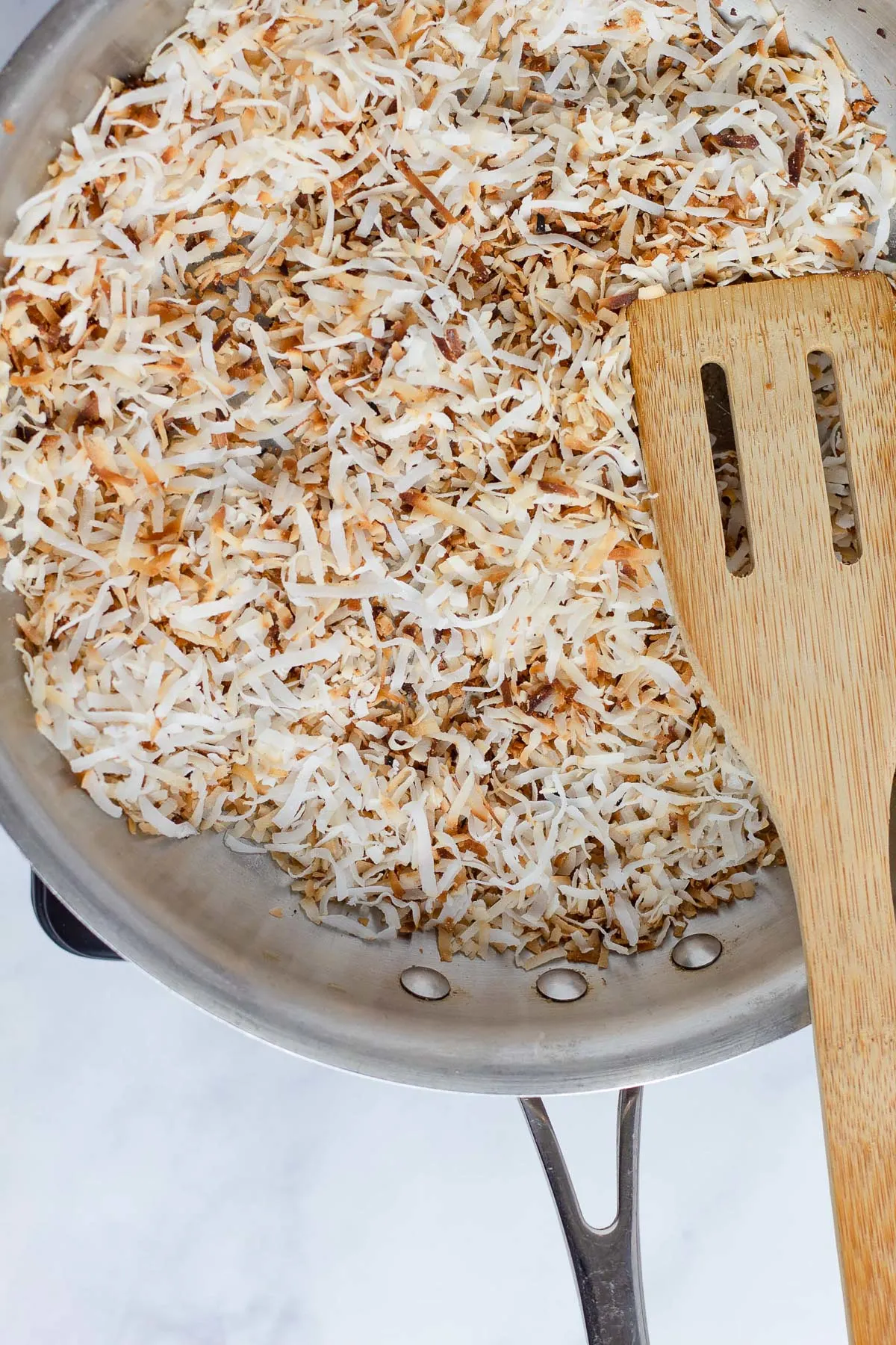 toasted shredded coconut in a pan
