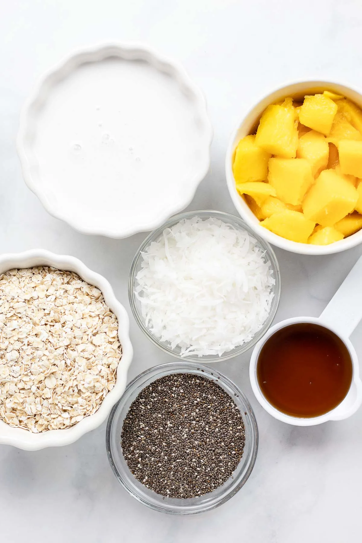 ingredients to make mango oatmeal with chia and coconut
