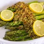 roasted asparagus side dish with bacon topping