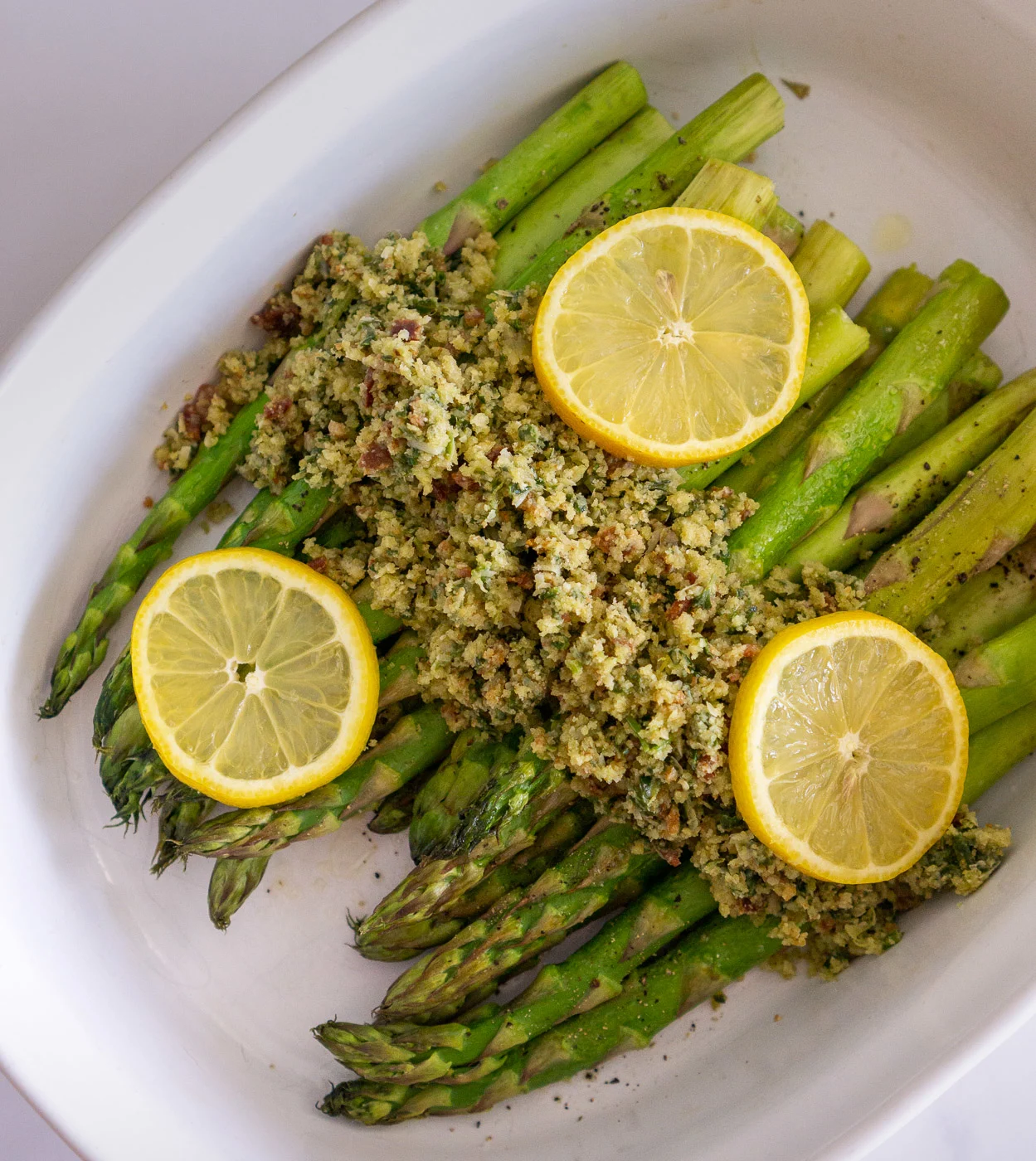 roasted asparagus side dish with bacon topping