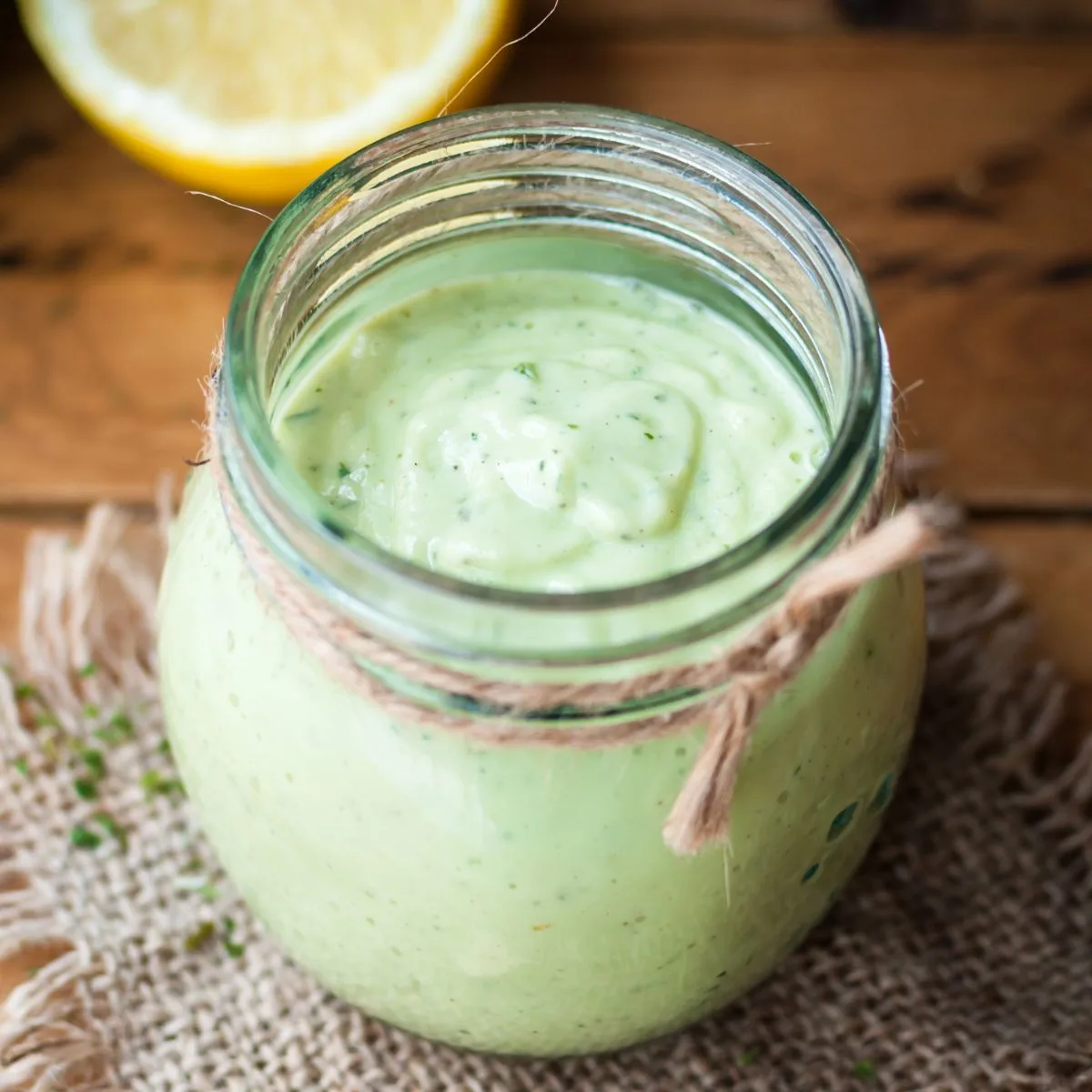 Creamy avocado dressing in a jar