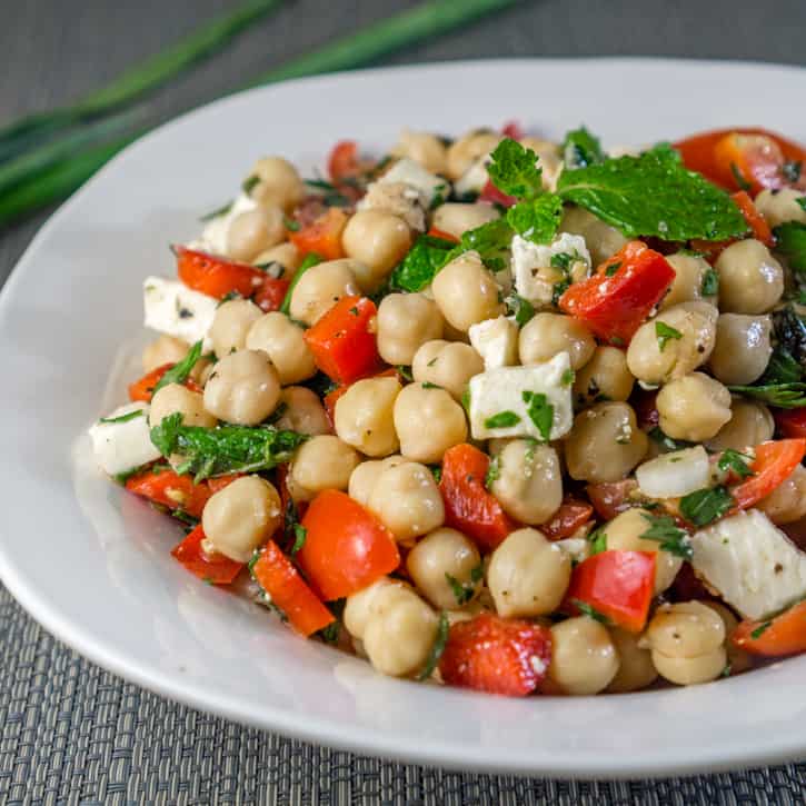 Chickpea salad with tomatoes, peppers, and feta.