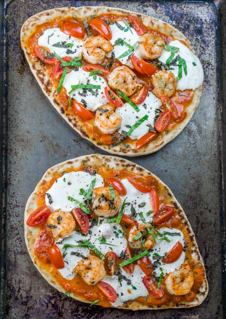 Naan Shrimp Pizzas with fresh basil - dinner is ready in 20 minutes! From https://www.babaganosh.org