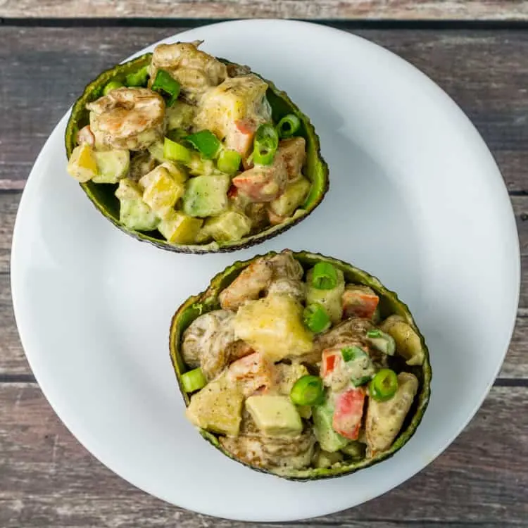 This gorgeous Tropical Shrimp Avocado Boats appetizer with yummy shrimp, juicy mango, and creamy avocado is sure to be a favorite!