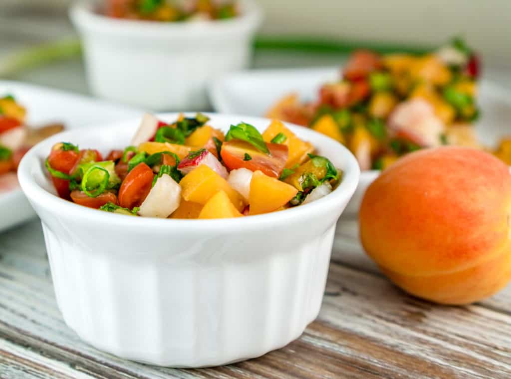 An easy 10 minute recipe for a fresh, delicious Tomato Apricot Relish. Serve this relish over pan-seared salmon, grilled chicken breast, or as bruschetta on crusty bread! From https://www.babaganosh.org