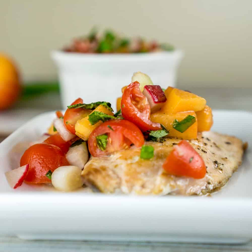 image of salmon fillet topped with tomato apricot relish