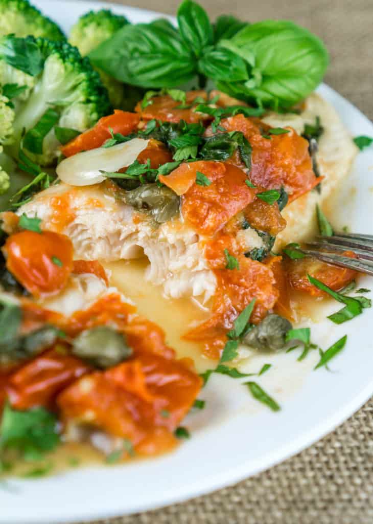 A truly wonderful dinner ready in 20 minutes! Tender flaky Swai Fillets with Tomato Caper Sauce are irresistible, easy to cook, and very healthy. This recipe is great way to use seasonal produce and herbs. From https://www.babaganosh.org