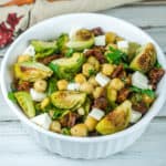 Roasted Brussels Sprouts and Chickpeas Salad with Sun-Dried Tomatoes and Queso Fresco in a lemony dressing. From www.www.babaganosh.org