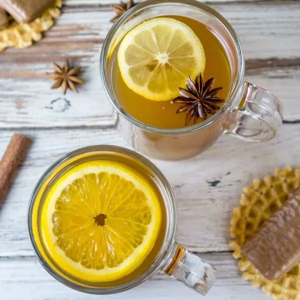 mug of spiced tea with lemon slices and anise star