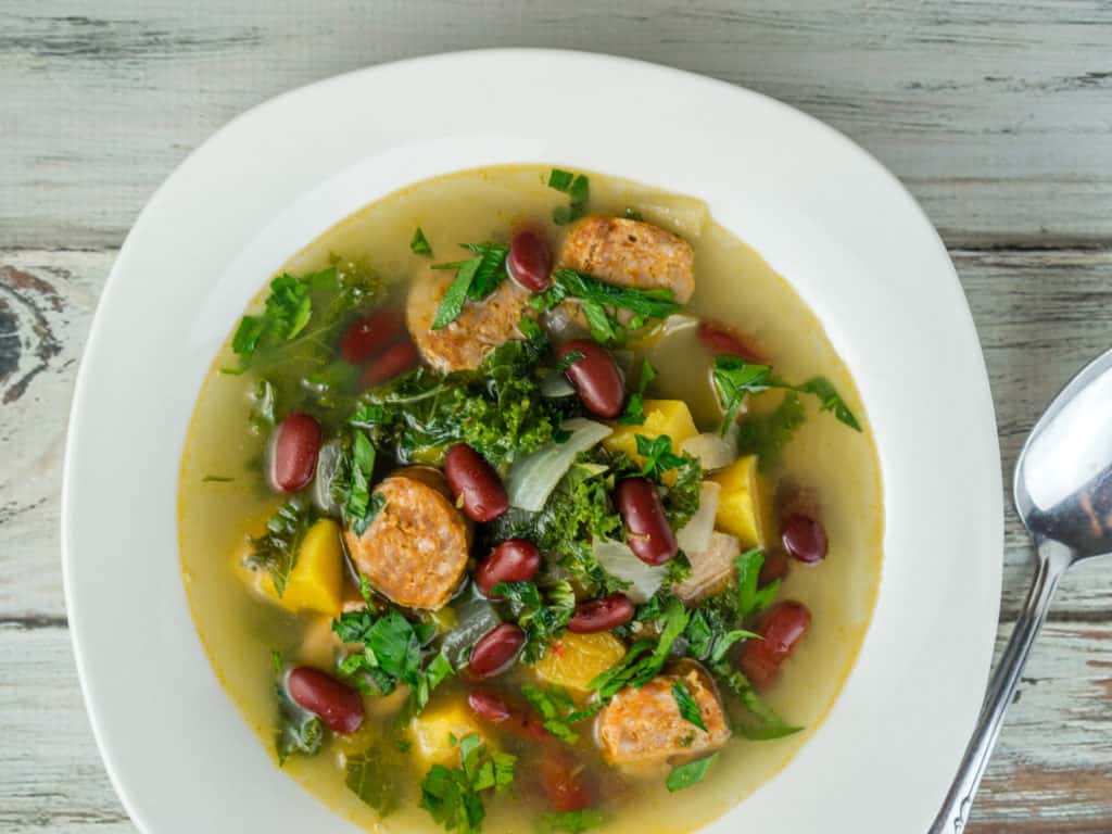 This Sausage & Kidney Bean Soup with butternut squash and kale is a favorite for cold weather!