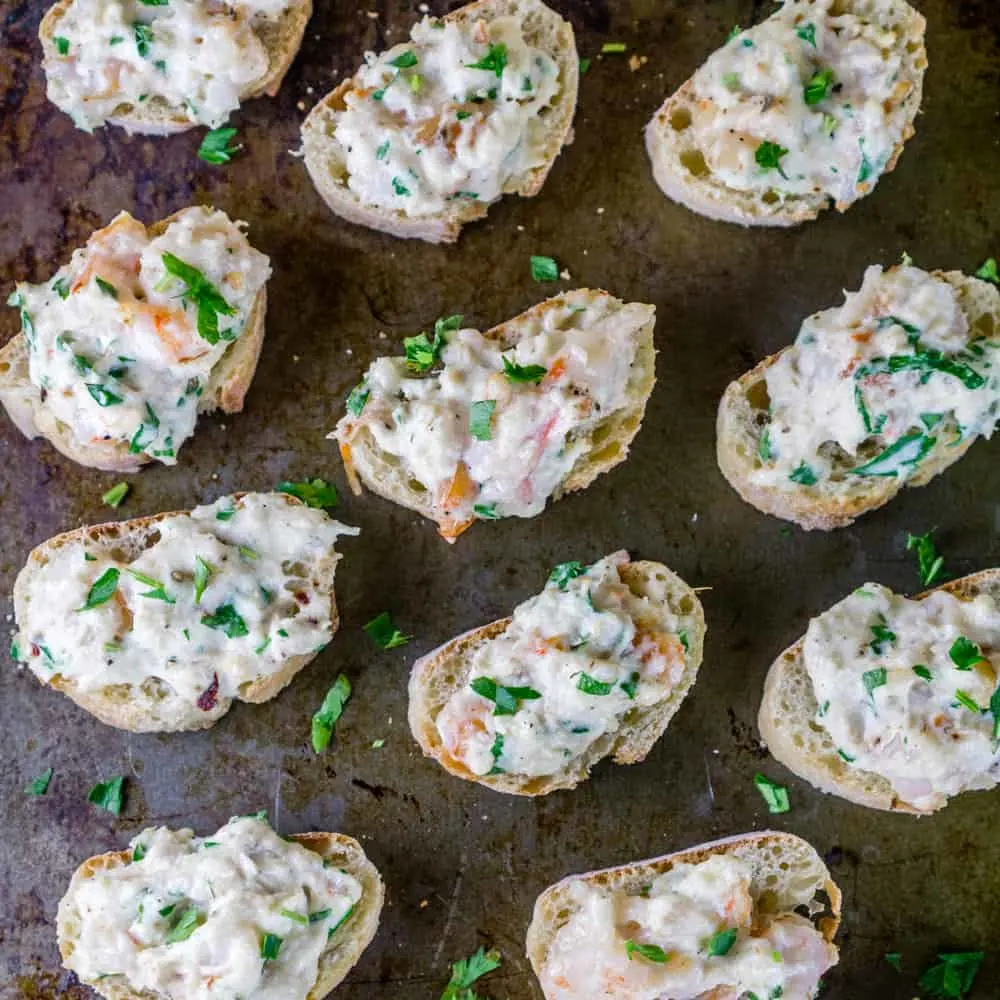 Make this super delicious Seafood Spread Appetizer to serve over crusty baguettes. This will become everyone's favorite party food!