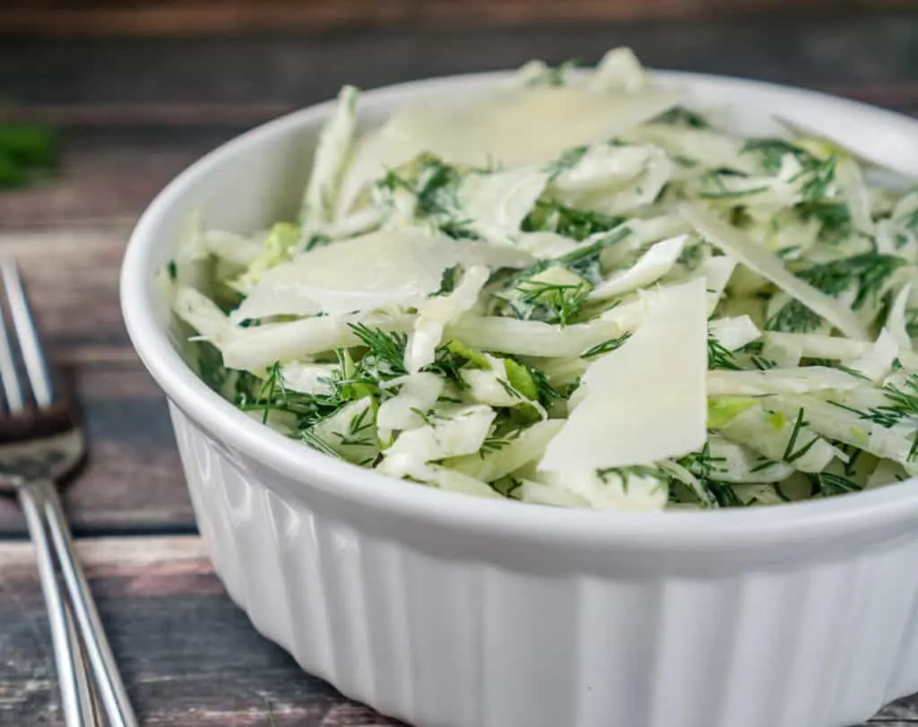 This crunchy Fennel Salad with Dill is absolutely addicting with delicious Parmesan cheese mixed into the dressing. It's super easy to make and will become a family favorite in no time! From www.www.babaganosh.org