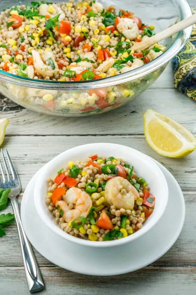 This Shrimp and Vegetable Couscous Salad can serve as a light and healthy meal or a hearty side. I like to serve it for dinner and cookouts, as it is a nice alternative to pasta salad!