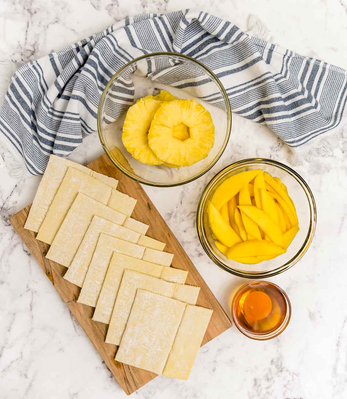 Ingredients to make pineapple and mango puff pastry squares