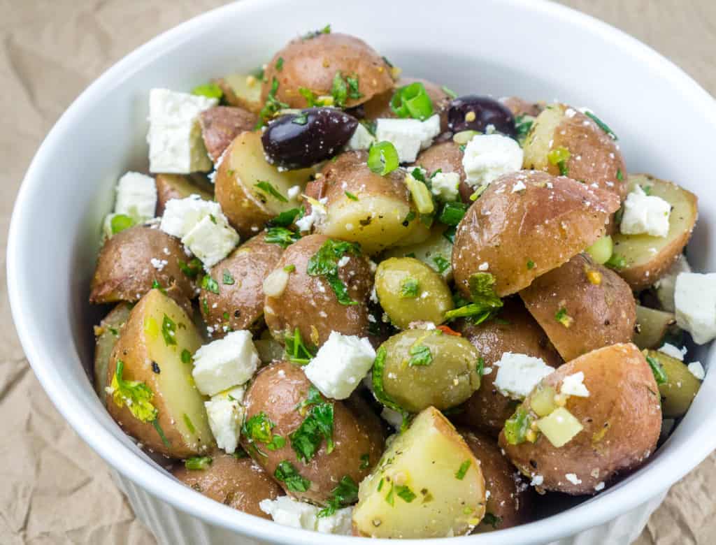No Mayo Potato Salad with Feta and Olives in a bowl