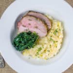 Roasted Pork Loin Dinner with Cheesy Grits and Sauteed Greens | Babaganosh.org