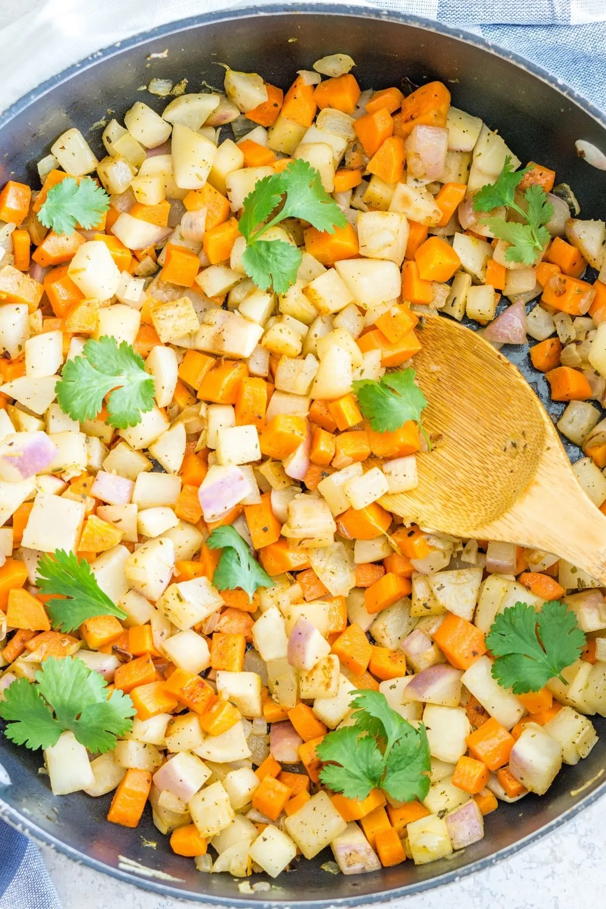 skillet of carrot turnip vegetable hash