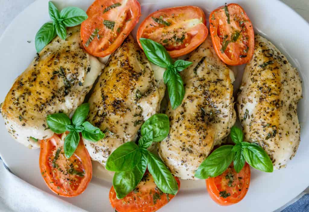 Spinach & Mozzarella Stuffed Chicken with Roasted Tomatoes Babaganosh