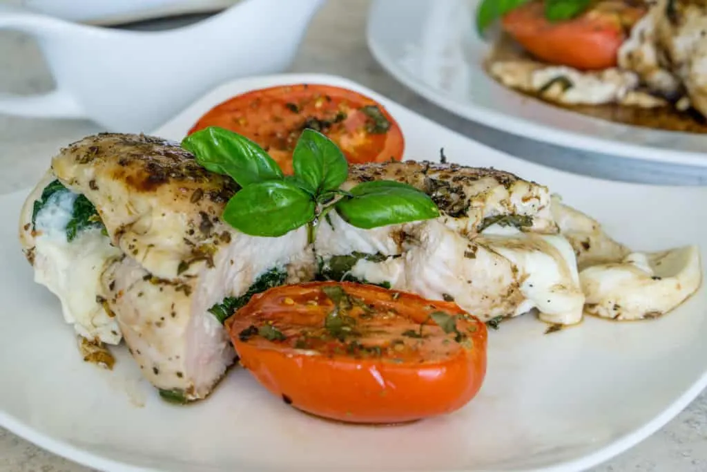 Spinach and Mozzarella Stuffed Chicken Breast with Roasted Tomatoes
