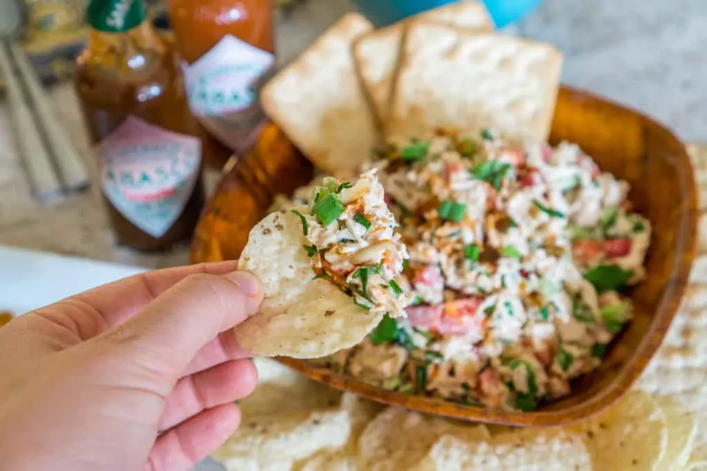 crunchy spicy chicken salad on a tortilla chip