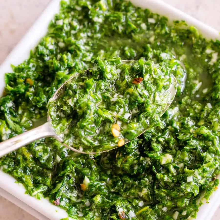 close up of parsley pesto on a spoon