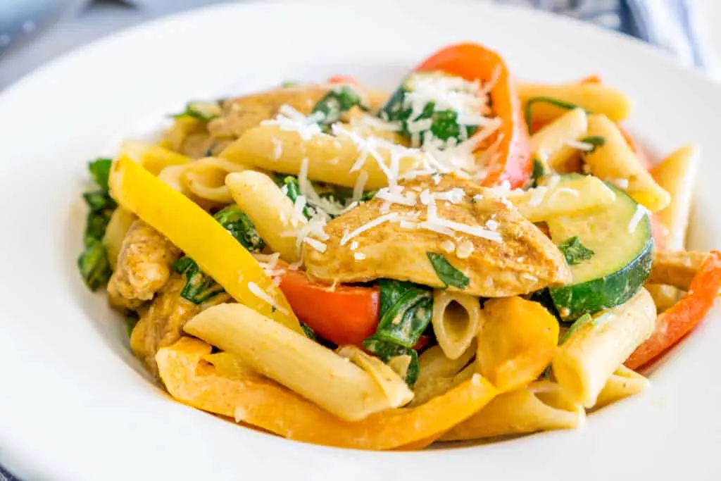 veggie-loaded creamy chicken fajita pasta in a plate