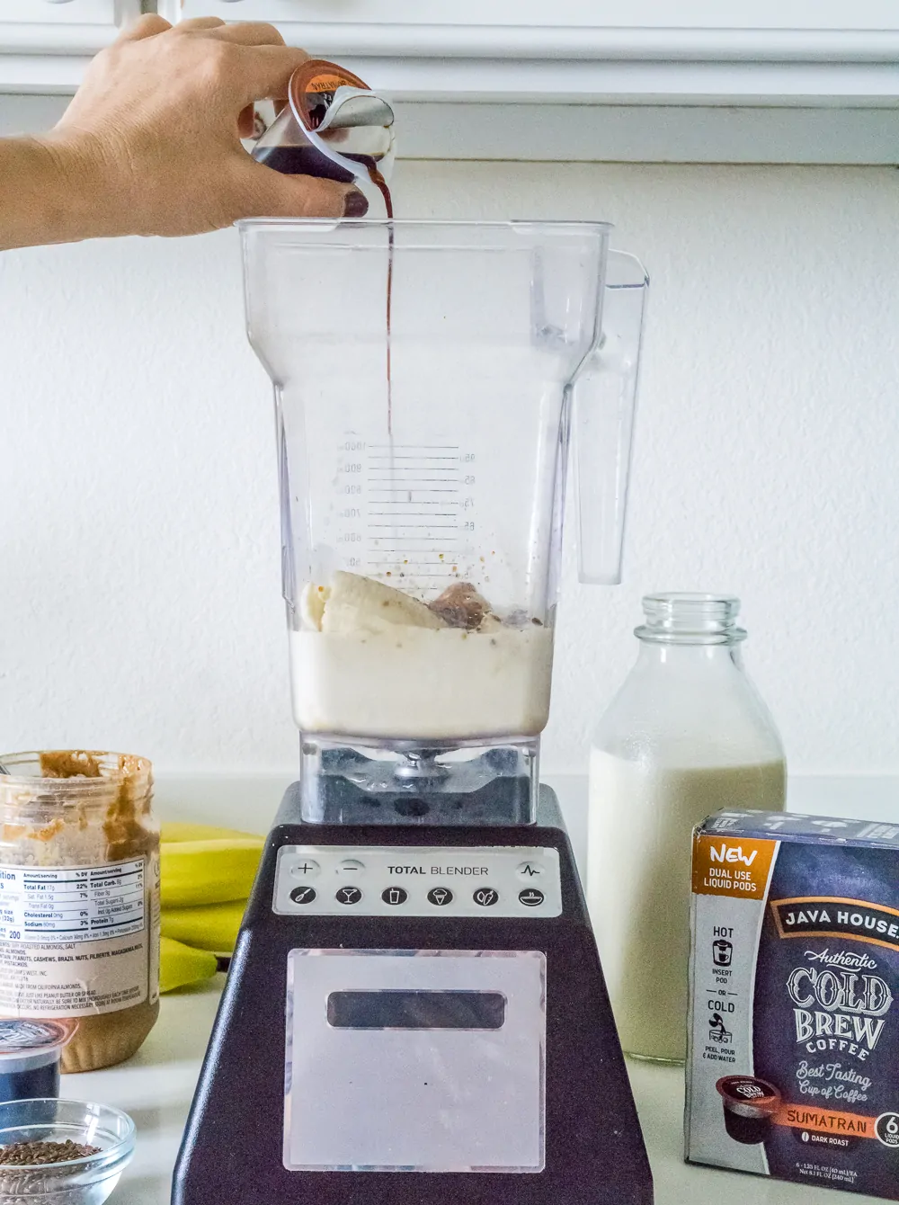 image of blender with breakfast smoothie ingredients