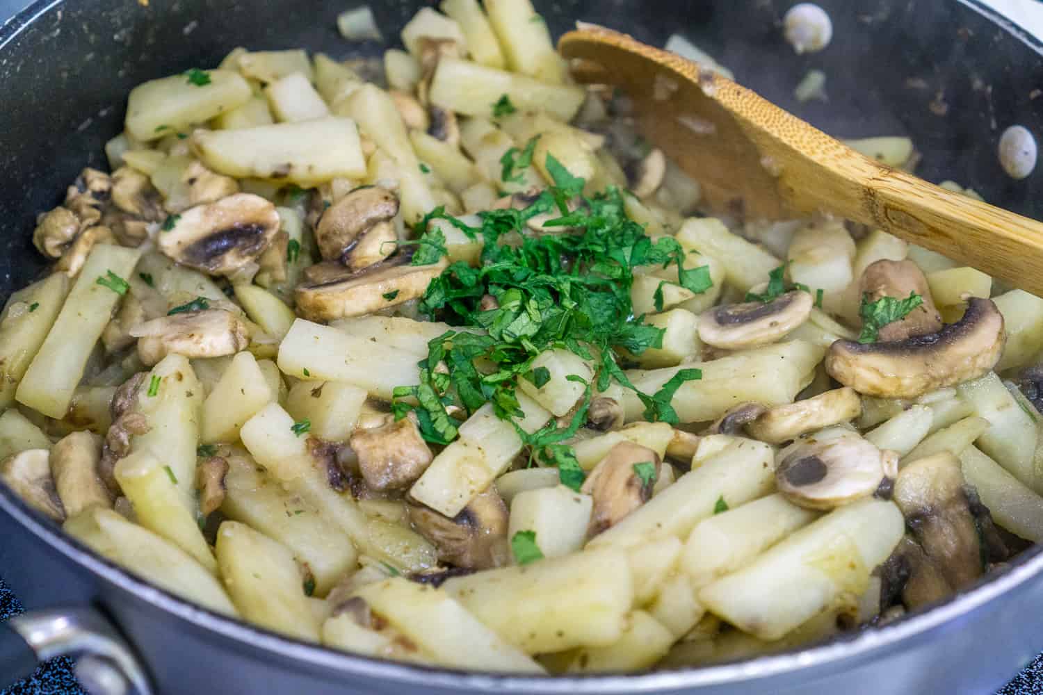 image of potatoes and mushrooms in skillet