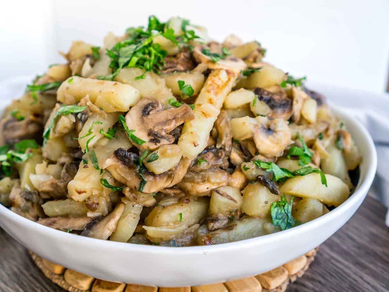 image of fried potatoes and mushrooms in a bowl