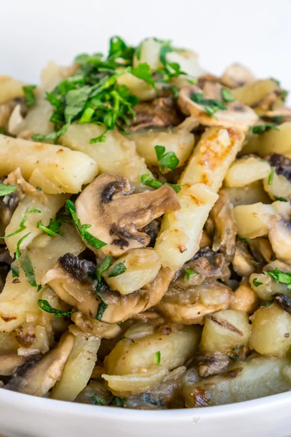 pinterest image of cooked potatoes and mushrooms