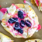 image of mulberry puff pastry dessert with pink and white glaze