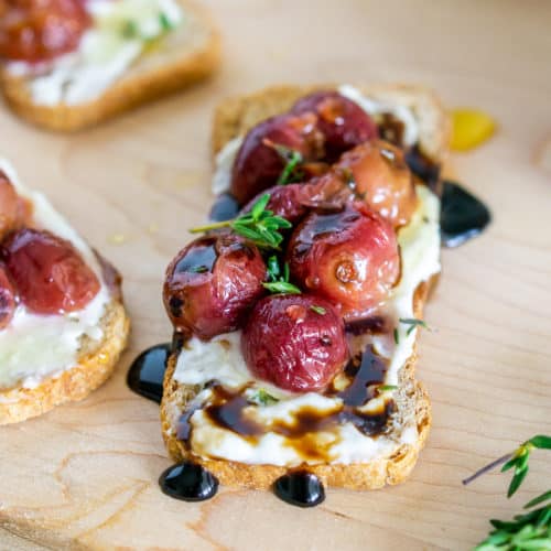 Blue Cheese Spread Crostini with Roasted Grapes Babaganosh