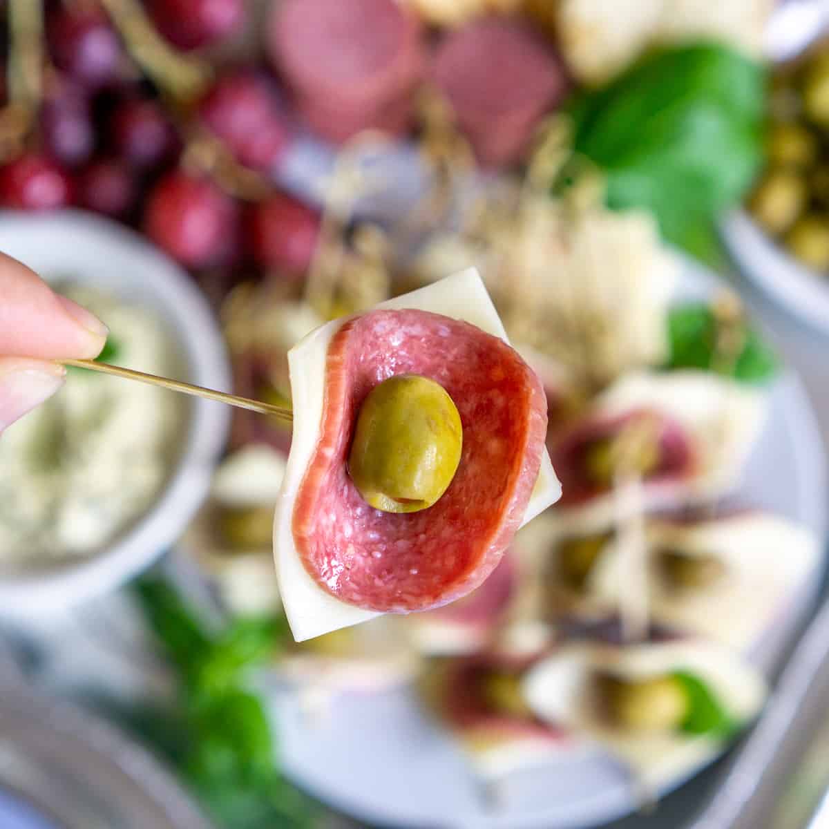 salami olive appetizer on a party toothpick